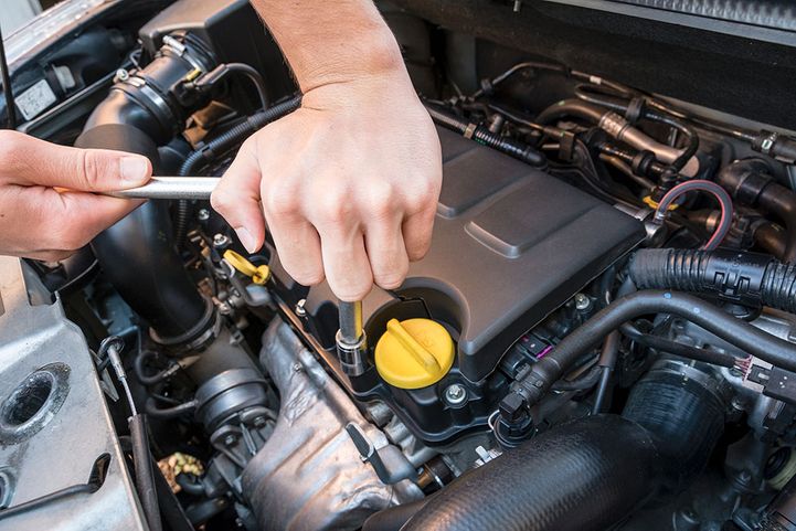 mechanic repairing car